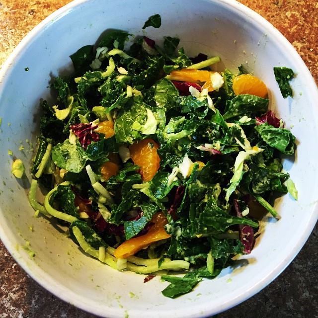 This is my lunch - kale, avocado, spinach, cabbage, brussel sprouts and mandarin oranges. Delicious!
